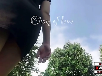 Thai Beauty with Elegant Curves Bathing in Nature s Embrace